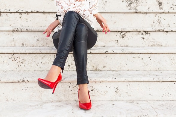 Lady with red high heel shoes