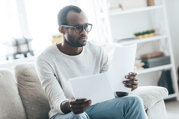 Man Reading Papers